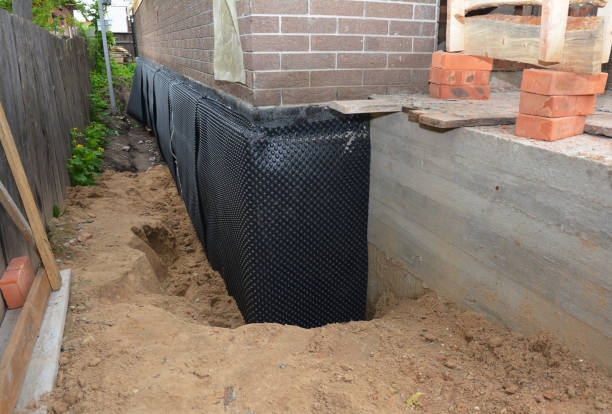 Happy homeowners after waterproofing job in Potsdam